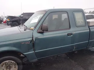 1997 Ford Ranger XLT with VIN 1FTCR14X3VPB26481, listed as a IAAI auction lot 41573728 with 209,256 mi miles. Bid and sale history available at carsss.com. Image 6.