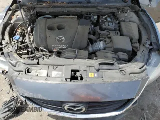 2017 Mazda 6 Sport z VIN JM1GL1U56H1138021, wystawiony jako Copart lot #57586765 z przebiegiem 104 354 mil mil oraz Szkoda całkowita • Salvage title. Historia ofert i sprzedaży dostępna na DreamBid. Obrazek 11.