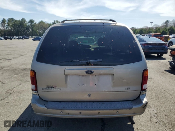 2003 Ford Windstar SE z VIN 2FMDA52473BB10747, wystawiony jako Copart lot #54301075 z przebiegiem 74 513 mil mil oraz Czysty tytuł • Clean title. Historia ofert i sprzedaży dostępna na DreamBid. Obrazek 6.