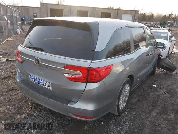 2019 Honda Odyssey LX with VIN 5FNRL6H20KB028201, listed as a IAAI auction lot 41787562 with 56,469 mi miles and . Bid and sale history available at DreamBid. Image 4.