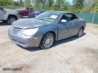 2008 Chrysler Sebring Touring with VIN 1C3LC55R98N118821, listed as a IAAI auction lot 42102685 with 211,537 mi miles. Bid and sale history available at carsss.com. Image 2.