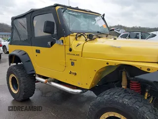 2000 Jeep Wrangler SE with VIN 1J4FA29P5YP705215, listed as a IAAI auction lot 41920532 with 92,927 mi miles and . Bid and sale history available at DreamBid. Image 19.