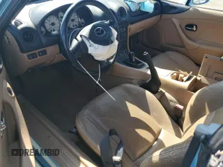 2001 Mazda MX-5 Miata z VIN JM1NB353910216600, wystawiony jako Copart lot #50916465 z przebiegiem Nie podano mil oraz Szkoda całkowita • Salvage title. Historia ofert i sprzedaży dostępna na DreamBid. Obrazek 8.