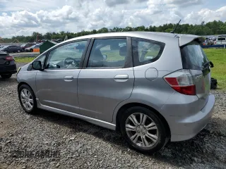 2009 Honda Fit Sport with VIN JHMGE88439S029286, listed as a Copart auction lot 63357784 with 112,705 mi miles and Salvage Title. Bid and sale history available at carsss.com. Image 2.