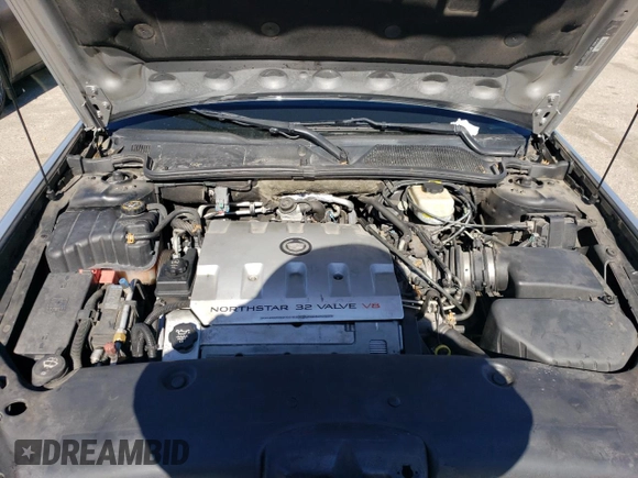 2003 Cadillac DTS Professional 1SH z VIN 1GEEH00Y93U500263, wystawiony jako Copart lot #77037214 z przebiegiem 63 197 mil mil oraz Tytuł czysty. Historia ofert i sprzedaży dostępna na DreamBid. Obrazek 11.