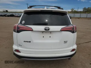 2018 Toyota RAV4 XLE with VIN 2T3RFREV2JW733050, listed as a Copart auction lot 53114585 with Not Provided miles and Salvage Title. Bid and sale history available at DreamBid. Image 6.