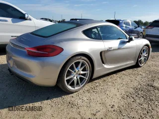 2014 Porsche Cayman S с VIN WP0AB2A89EK190939, выставлен на аукционе Copart как лот 73934334 с пробегом 22 719 миль миль и Списание • Salvage title. История ставок и продаж доступна на DreamBid. Изображение 3.