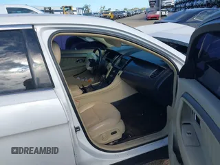 2015 Ford Taurus SEL z VIN 1FAHP2E81FG105404, wystawiony jako IAAI lot #40888773 z przebiegiem Nie podano mil oraz . Historia ofert i sprzedaży dostępna na DreamBid. Obrazek 5.