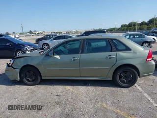 2006 Chevrolet Malibu Maxx LT z VIN 1G1ZT61856F263525, wystawiony jako IAAI lot #41977197 z przebiegiem 274 115 mil mil oraz . Historia ofert i sprzedaży dostępna na DreamBid. Obrazek 14.