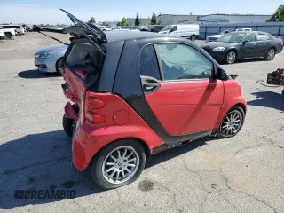 2014 Smart fortwo Pure z VIN WMEEJ3BA6EK745679, wystawiony jako Copart lot #56242784 z przebiegiem 86 991 mil mil oraz Szkoda całkowita • Salvage title. Historia ofert i sprzedaży dostępna na DreamBid. Obrazek 3.