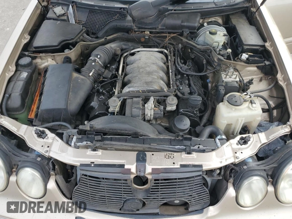 2001 Mercedes-Benz E-Class with VIN WDBJF70JX1B194075, listed as a Copart auction lot 70482944 with 218,319 mi miles and Salvage Title. Bid and sale history available at carsss.com. Image 11.