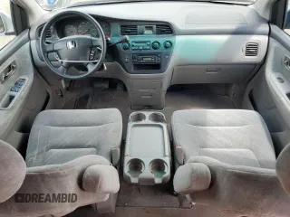2003 Honda Odyssey EX z VIN 5FNRL186X3B075761, wystawiony jako Copart lot #58289815 z przebiegiem 137 763 mil mil oraz Szkoda całkowita • Salvage title. Historia ofert i sprzedaży dostępna na DreamBid. Obrazek 8.