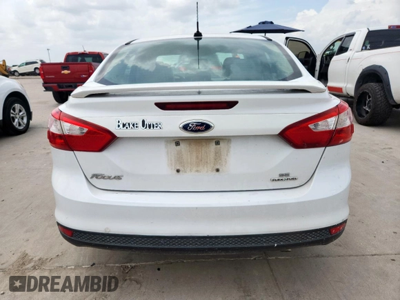 2013 Ford Focus SE with VIN 1FADP3F20DL289978, listed as a Copart auction lot 63350585 with 211,677 mi miles and Salvage title. Bid and sale history available at DreamBid. Image 6.