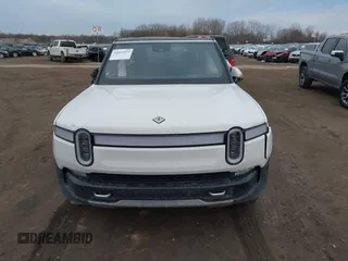 2024 Rivian R1S Adventure z VIN 7PDSGABA4RN039358, wystawiony jako IAAI lot #41824503 z przebiegiem 15 656 mil mil oraz . Historia ofert i sprzedaży dostępna na DreamBid. Obrazek 11.