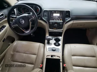 2014 Jeep Grand Cherokee Limited z VIN 1C4RJFBG7EC546642, wystawiony jako Copart lot #61445615 z przebiegiem 128 921 mil mil oraz Szkoda całkowita • Salvage title. Historia ofert i sprzedaży dostępna na DreamBid. Obrazek 8.