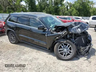 2018 Jeep Grand Cherokee Laredo E with VIN 1C4RJEAG1JC354221, listed as a Copart auction lot 58002715 with 108,223 mi miles and Salvage title. Bid and sale history available at DreamBid. Image 4.