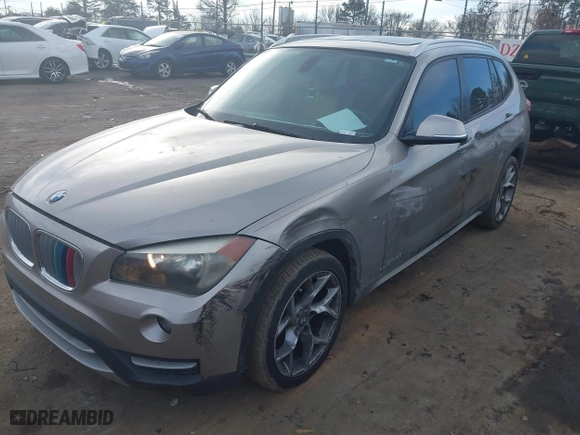 2014 BMW X1 sDrive28i with VIN WBAVM1C52EVW48857, listed as a IAAI auction lot 41179830 with 113,315 mi miles. Bid and sale history available at carsss.com. Image 2.
