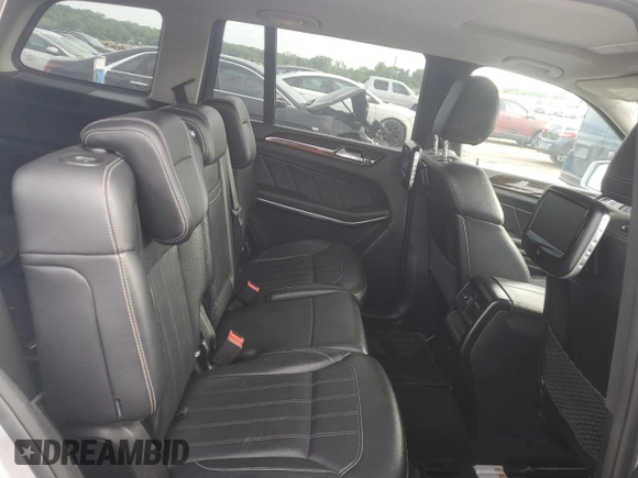 2014 Mercedes-Benz GL 450 с VIN 4JGDF7CE3EA303495, выставлен на аукционе Copart как лот 55121695 с пробегом 114 070 миль миль и Чистый • Clean title. История ставок и продаж доступна на DreamBid. Изображение 11.