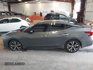 2017 Nissan Maxima SV with VIN 1N4AA6AP1HC427784, listed as a IAAI auction lot 41533604 with 111,295 mi miles and . Bid and sale history available at DreamBid. Image 14.