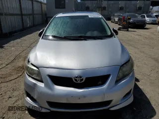 2010 Toyota Corolla with VIN 2T1BU4EE8AC427717, listed as a Copart auction lot 57528435 with 142,826 mi miles and Salvage title. Bid and sale history available at DreamBid. Image 5.