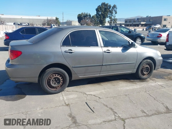 2003 Toyota Corolla CE with VIN 1NXBR32E43Z059733, listed as a IAAI auction lot 41431469 with 299,999 mi miles and . Bid and sale history available at DreamBid. Image 4.