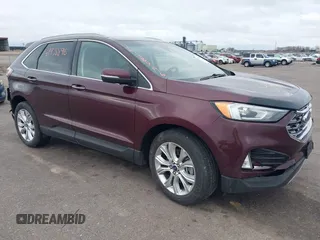 2020 Ford Edge Titanium z VIN 2FMPK4K91LBB56297, wystawiony jako IAAI lot #41938896 z przebiegiem 79 875 mil mil oraz . Historia ofert i sprzedaży dostępna na DreamBid. Obrazek 1.