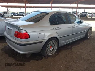2002 BMW 3 Series 330i with VIN WBAEV53422KM20771, listed as a IAAI auction lot 42703688 with 180,402 mi miles and . Bid and sale history available at DreamBid. Image 4.