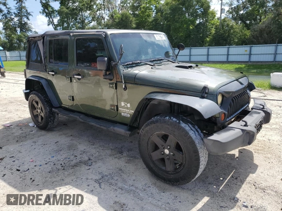 2008 Jeep Wrangler Unlimited X with VIN 1J4GA39118L633877, listed as a Copart auction lot 63652795 with 129,856 mi miles and Clean title. Bid and sale history available at DreamBid. Image 4.