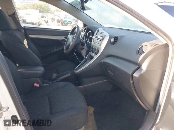 2009 Pontiac Vibe with VIN 5Y2SM67059Z401610, listed as a IAAI auction lot 42150702 with 225,835 mi miles. Bid and sale history available at carsss.com. Image 5.