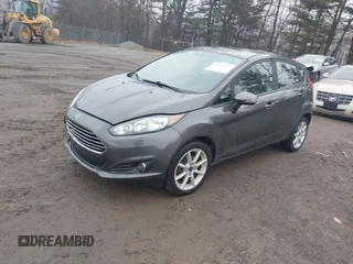 2018 Ford Fiesta SE with VIN 3FADP4EJ9JM126299, listed as a IAAI auction lot 41660973 with 74,730 mi miles. Bid and sale history available at carsss.com. Image 2.