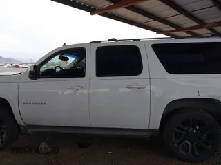 2011 Chevrolet Suburban LT with VIN 1GNSKJE31BR187475, listed as a IAAI auction lot 41799366 with 203,476 mi miles. Bid and sale history available at carsss.com. Image 14.