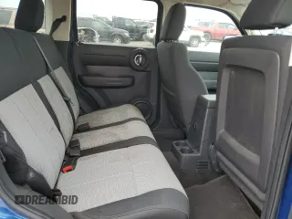 2009 Dodge Nitro SE with VIN 1D8GT28KX9W533248, listed as a Copart auction lot 70500994 with 124,091 mi miles and Salvage Title. Bid and sale history available at DreamBid. Image 11.