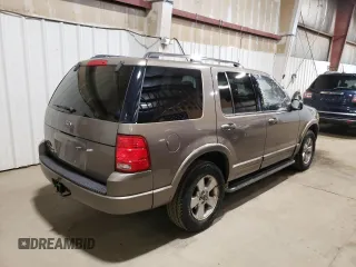 2003 Ford Explorer Limited z VIN 1FMZU75K43UC24704, wystawiony jako Copart lot #58601065 z przebiegiem 104 772 mil mil oraz Tytuł czysty. Historia ofert i sprzedaży dostępna na DreamBid. Obrazek 3.