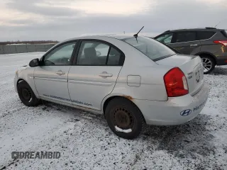 2007 Hyundai Accent GL z VIN KMHCN45CX7U127037, wystawiony jako Copart lot #86041984 z przebiegiem 212 828 mil mil oraz Szkoda całkowita • Salvage title. Historia ofert i sprzedaży dostępna na DreamBid. Obrazek 2.