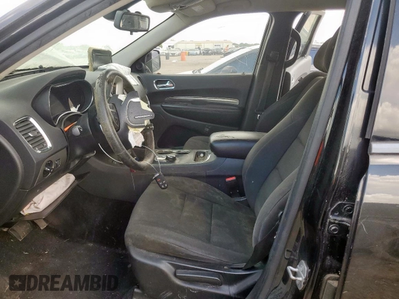 2015 Dodge Durango SXT with VIN 1C4RDHAGXFC695097, listed as a Copart auction lot 61503785 with 210,649 mi miles and Clean title. Bid and sale history available at DreamBid. Image 7.