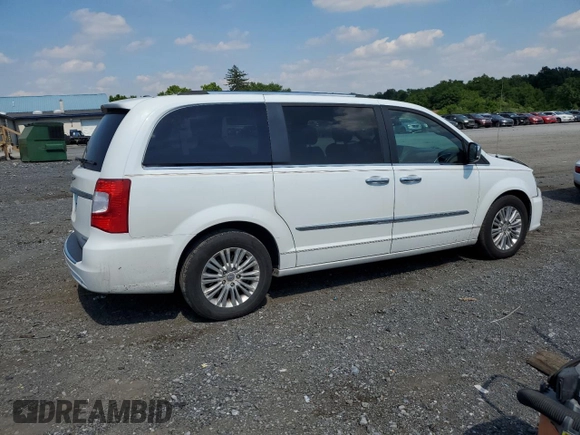 2014 Chrysler Town & Country Limited with VIN 2C4RC1GG7ER461197, listed as a Copart auction lot 59426574 with 96,068 mi miles and Salvage Title. Bid and sale history available at DreamBid. Image 3.