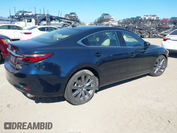 2021 Mazda 6 Grand Touring with VIN JM1GL1TY3M1619771, listed as a IAAI auction lot 40964809 with 25,816 mi miles and . Bid and sale history available at DreamBid. Image 4.