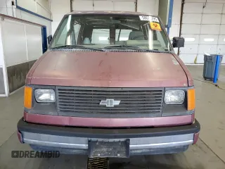1985 Chevrolet Astro z VIN 1GCDM15N6FB158114, wystawiony jako Copart lot #58625295 z przebiegiem 97 643 mil mil oraz Czysty tytuł • Clean title. Historia ofert i sprzedaży dostępna na DreamBid. Obrazek 5.
