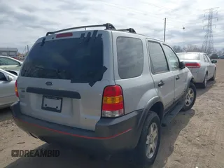 2003 Ford Escape XLT Popular 2 with VIN 1FMYU93163KC74842, listed as a IAAI auction lot 41828112 with 171,988 mi miles. Bid and sale history available at carsss.com. Image 4.