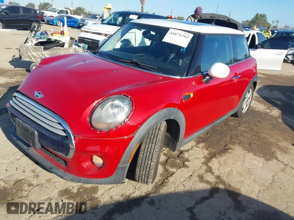2014 MINI Hardtop with VIN WMWXM5C53ET933238, listed as a IAAI auction lot 41871315 with 83,788 mi miles and . Bid and sale history available at DreamBid. Image 2.