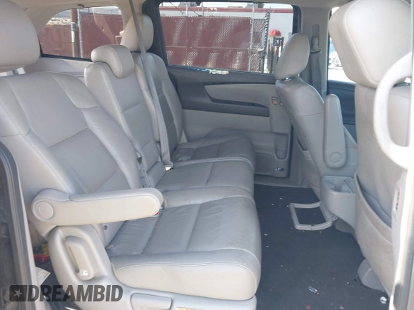 2011 Honda Odyssey EX-L with VIN 5FNRL5H64BB070836, listed as a IAAI auction lot 42520878 with 162,316 mi miles and . Bid and sale history available at DreamBid. Image 8.