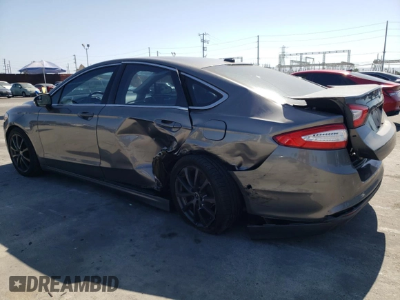 2013 Ford Fusion SE Hybrid z VIN 3FA6P0LUXDR362711, wystawiony jako Copart lot #57060425 z przebiegiem 155 031 mil mil oraz Szkoda całkowita • Salvage title. Historia ofert i sprzedaży dostępna na DreamBid. Obrazek 2.