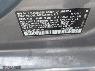 2012 Volkswagen Passat SE with VIN 1VWBP7A35CC024137, listed as a IAAI auction lot 41572782 with 138,827 mi miles. Bid and sale history available at carsss.com. Image 9.