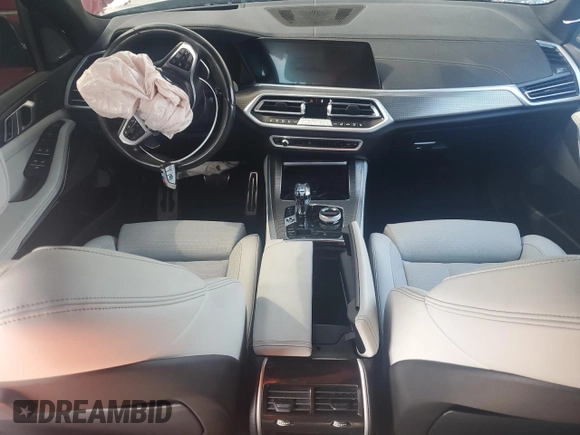 2023 BMW X5 xDrive40i with VIN 5UXCR6C07P9R18608, listed as a Copart auction lot 55911595 with Not provided miles and Salvage title. Bid and sale history available at DreamBid. Image 8.