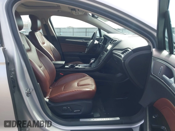 2016 Ford Fusion Titanium with VIN 3FA6P0K92GR214408, listed as a IAAI auction lot 41921923 with 126,063 mi miles and . Bid and sale history available at carsss.com. Image 5.