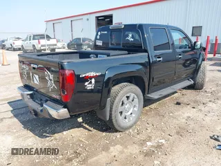 2012 GMC Canyon SLE2 with VIN 1GTH6PFE4C8156674, listed as a IAAI auction lot 42446335 with 130,464 mi miles and . Bid and sale history available at DreamBid. Image 4.