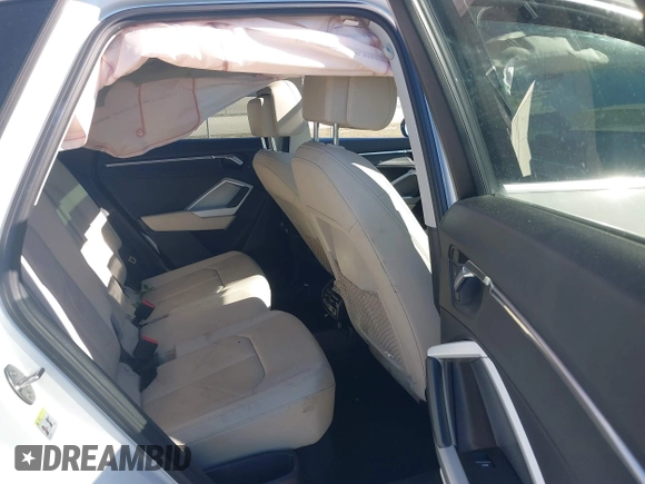 2021 Audi Q3 Premium with VIN WA1AUCF32M1097059, listed as a IAAI auction lot 41825132 with 66,144 mi miles and . Bid and sale history available at DreamBid. Image 8.