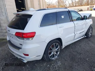 2020 Jeep Grand Cherokee Summit with VIN 1C4RJFJT0LC163752, listed as a IAAI auction lot 38725572 with 49,652 mi miles and . Bid and sale history available at DreamBid. Image 4.