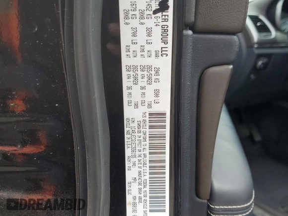 2014 Jeep Grand Cherokee Overland with VIN 1C4RJECG1EC556155, listed as a Copart auction lot 75641034 with 116,549 mi miles and Salvage Title. Bid and sale history available at carsss.com. Image 13.
