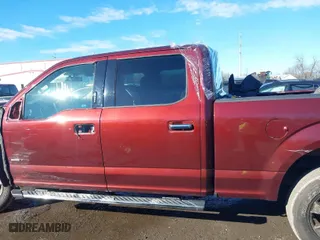 2015 Ford F-150 XLT w/HD Payload Pkg with VIN 1FTFW1EG9FFC44739, listed as a IAAI auction lot 41193582 with 121,169 mi miles. Bid and sale history available at carsss.com. Image 14.